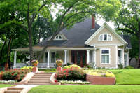 classic house with flower garden